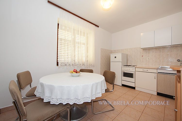 apartments Podra�e, Brela - Neven & Dubravko &Scaron;o&scaron;i�, dining table, kitchen